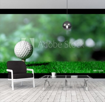 Picture of Golf ball on green turf and green background